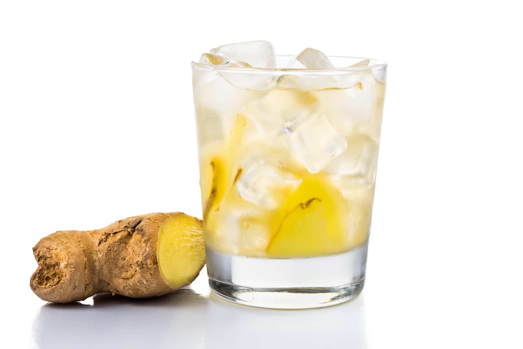 Refreshing ice cold ginger tea in transparent glass